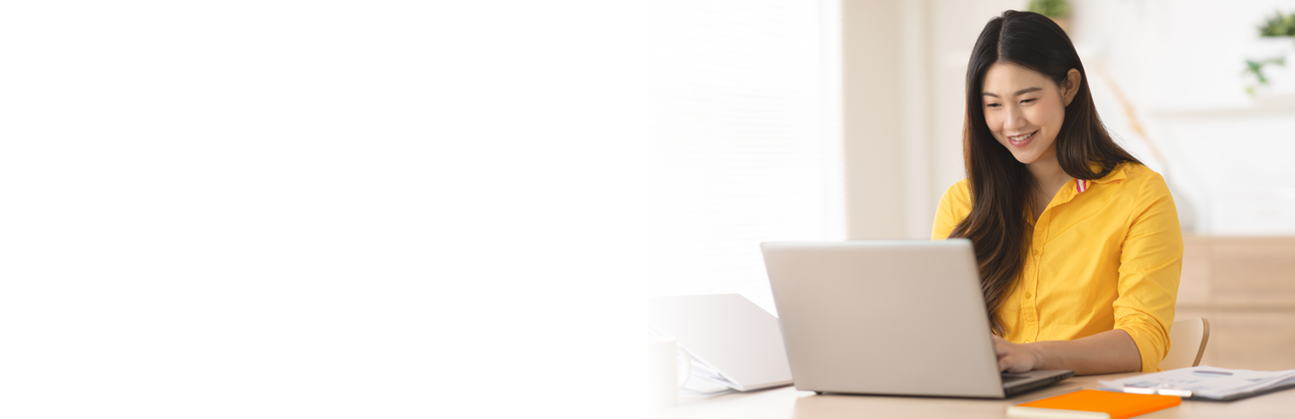 Entrepreneur beautiful business asian young woman wear yellow shirt work online with laptop at home.Freelance woman working online sale marketing at home.Small Business Startup concept.Tracking Shot